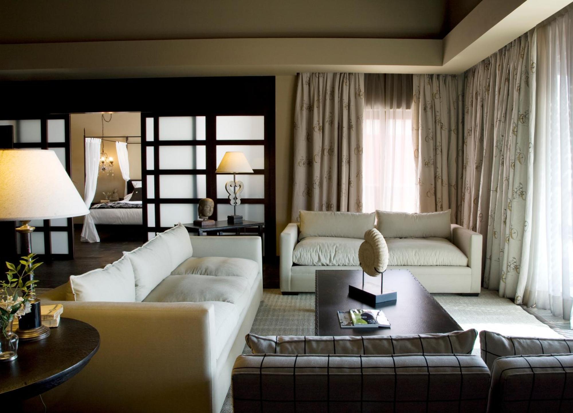 فندق إيشا جاردنز آند تاي سبا، إيه رويال هايدواي فينيسترات المظهر الخارجي الصورة A suite at the Mandarin Oriental, Munich