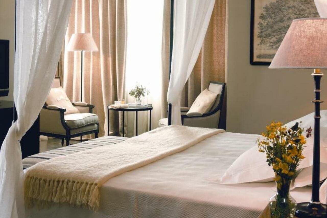 فندق إيشا جاردنز آند تاي سبا، إيه رويال هايدواي فينيسترات المظهر الخارجي الصورة A bedroom at the Mandarin Oriental, Bangkok